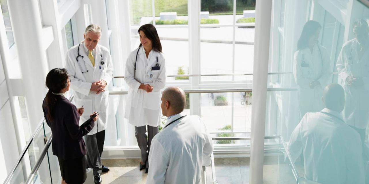 Doctors talking in hallway