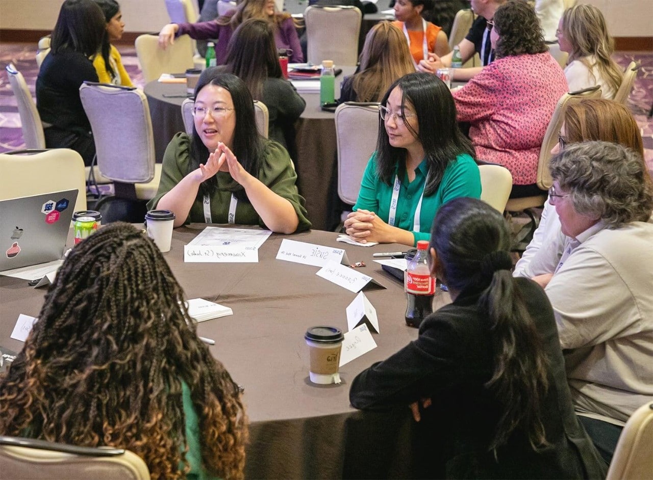 People Collaborating While Seated at-a Table