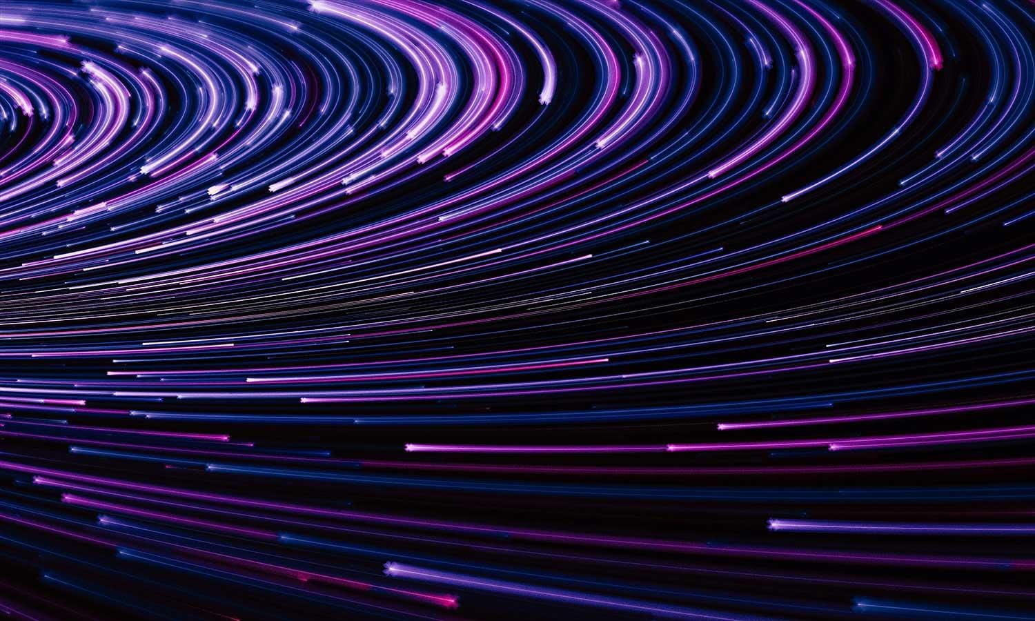 Abstract purple optical fibers on black background