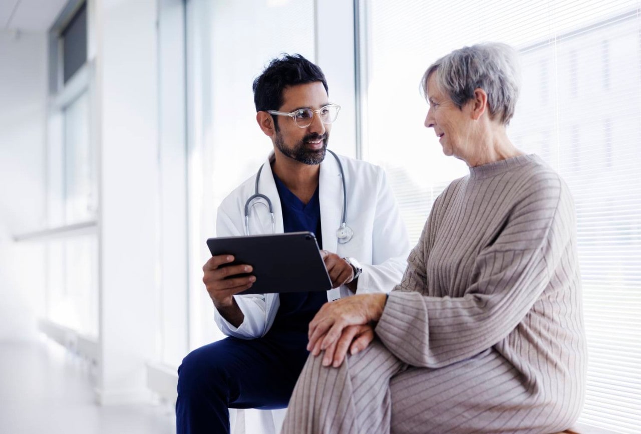 Doctor consults with patient