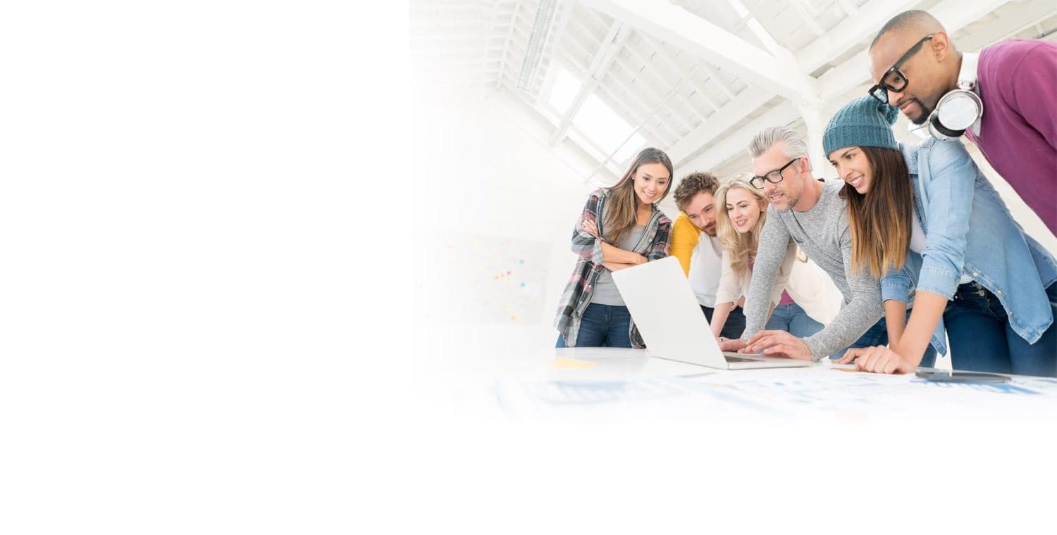 Young Professionals Collaborating in Front of a Computer