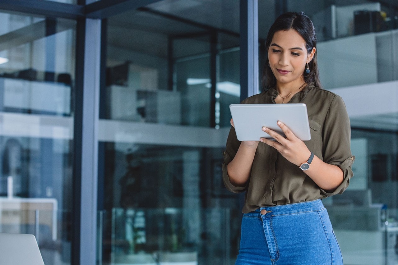 Woman reading tablet