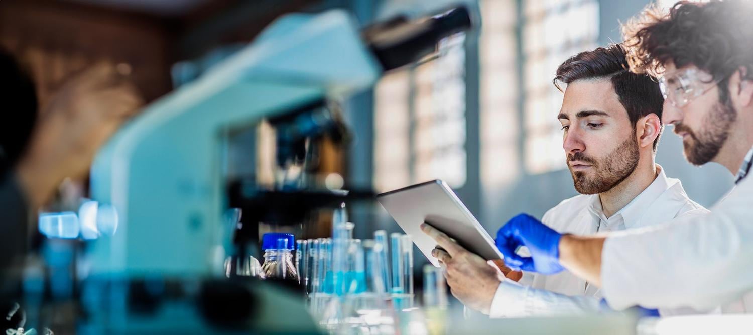 Scientist working on tablet