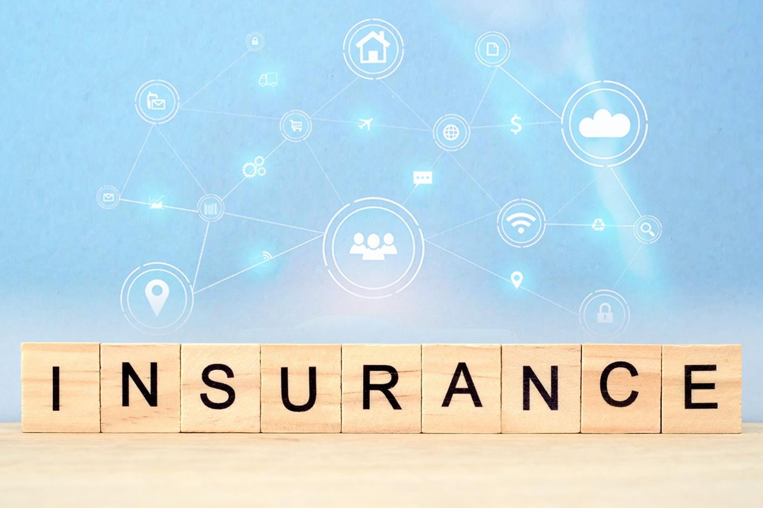 Insurance spelled out in Scrabble tiles