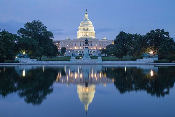 Image of US Capitol building at night