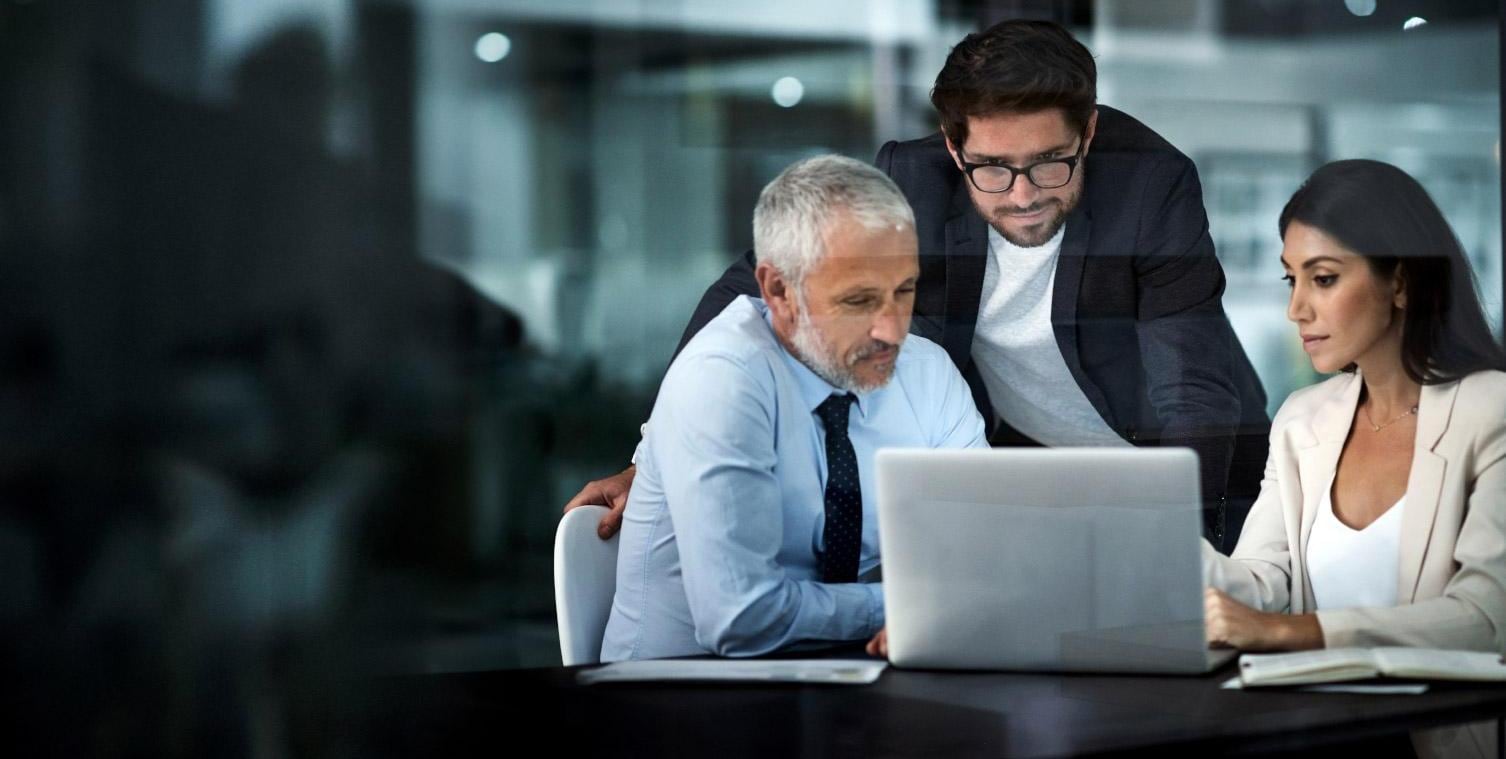 Colleagues using a laptop together