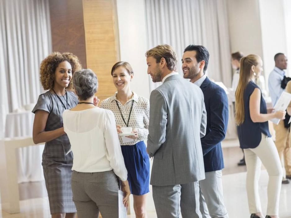 Colleagues chatting at conference