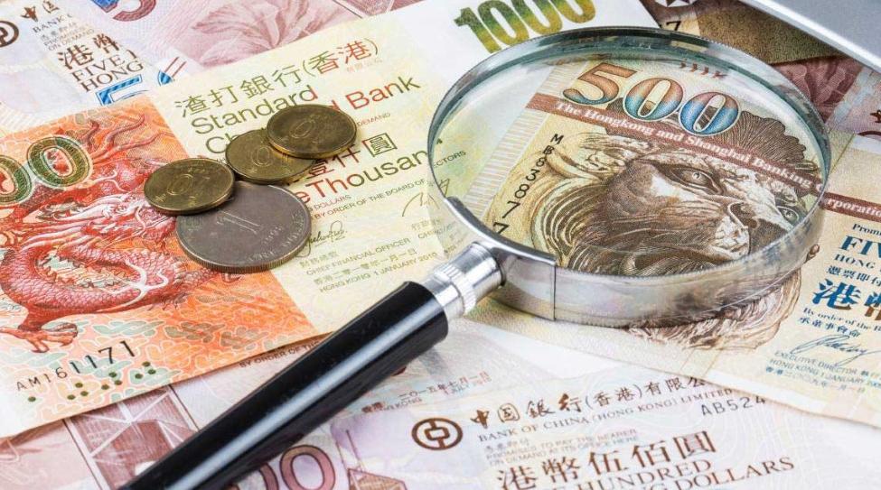 magnifying glass on Chinese currency